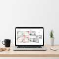 Screen mockup showing floral social-media and photography templates on a laptop