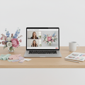 Laptop showing a virtual floral styling consultation with flowers and swatches on a bright desk